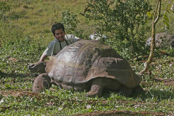 Juan and giant tortoise